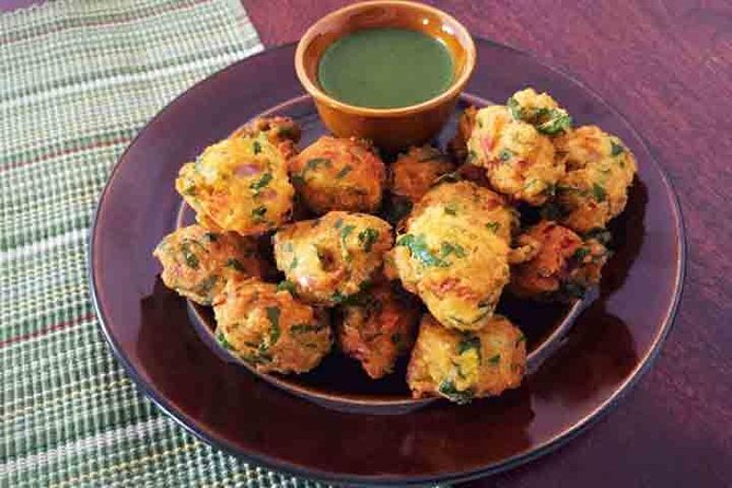 Jaipur Evening Food & market Tour: Savor the Test of the Jaipur - Stop 4: Rawat Misthan Bhandar for sweets and savory snacks