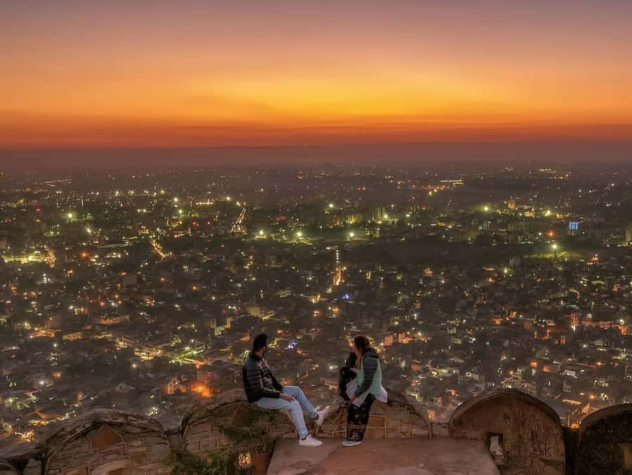Jaipur: Tour with Nahargarh Sunrise or Monkey Temple Sunset - Evening itinerary: Panna Meena Stepwell, Amber Fort at dusk, and Jal Mahal reflections