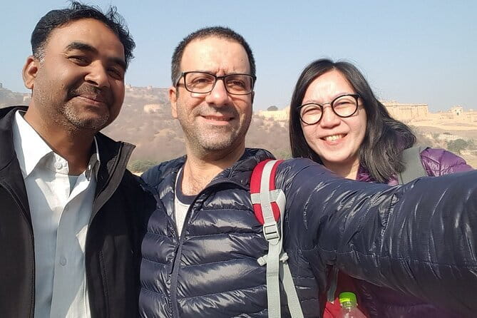 Private Jaipur Sightseeing Tour with Car and Guide - City Palace and Royal Gaitor Tombs: power in rooms, calm in stone